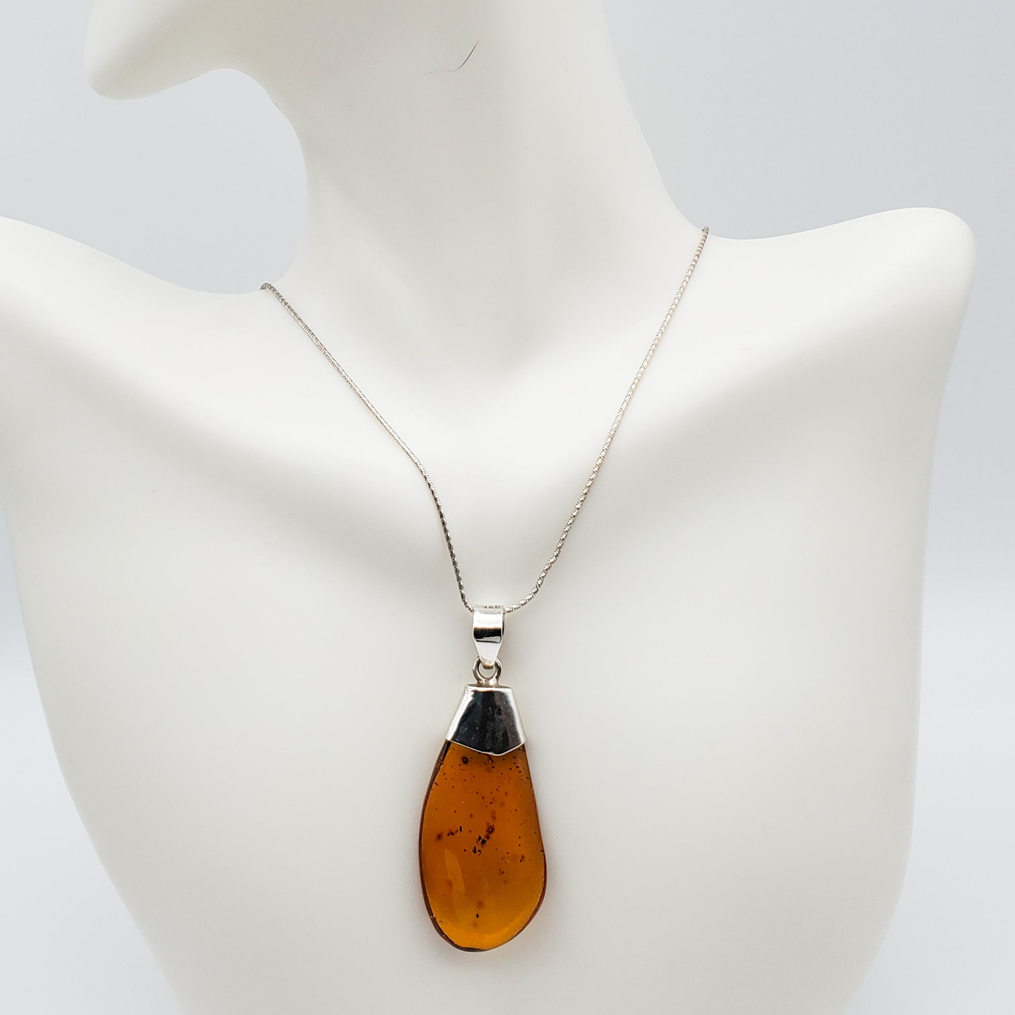 Danam Antik * Droplet-shaped Amber Pendant